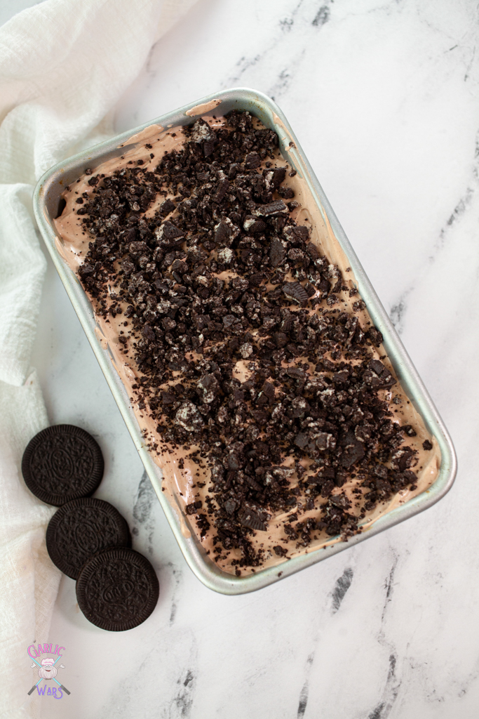 ice cream in loaf pan with Oreos