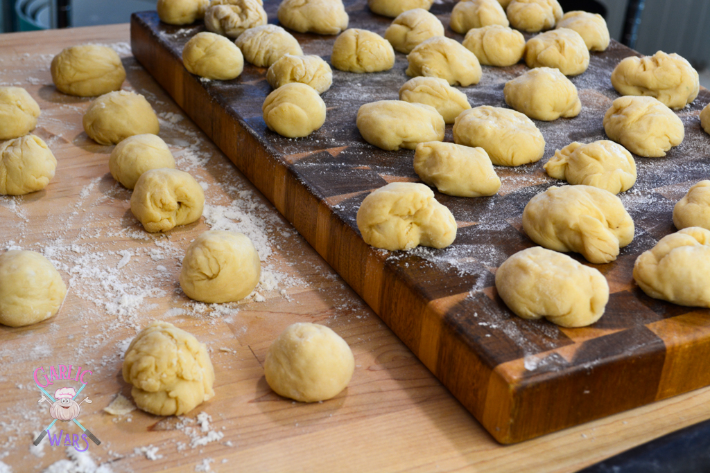 dough pieces rolled into balls