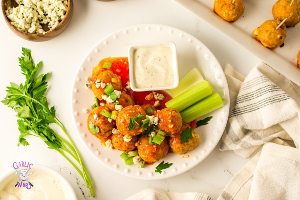 buffalo chicken meatballs served with ranch dressing and celery sticks