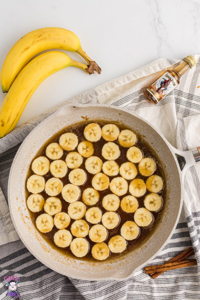 bananas in saute pan with caramel