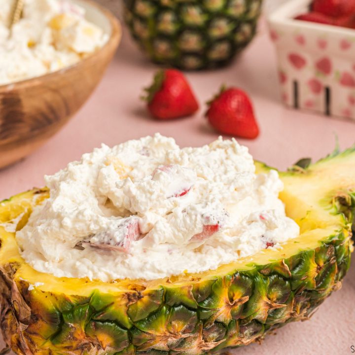 cheesecake salad in a pineapple bowl