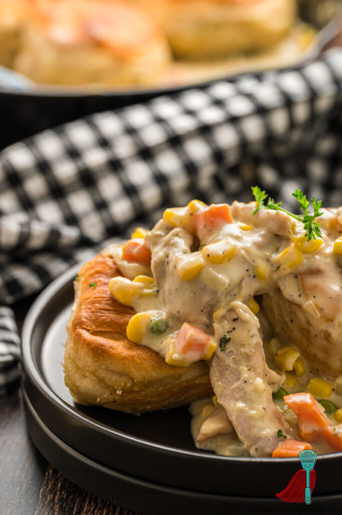 side shot of chicken pot pie made with biscuits